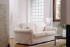 Richard white fabric sofa with classical lines.