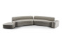Large sofa with one arm and a low side pouf