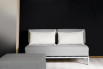 Willy is a sofa bed with slide-out base and embossed metal structure.