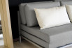 Detail of the additional backrest cushions and pillows.