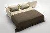 Double bed obtained from a sofa with chaise longue (the backrest visible on the right is fixed).