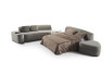 A large sofa made of two modules, one with pull out bed
