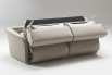 Backrest with storage compartments for the pillows