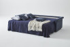 Thanks to the horizontal opening of the mattress, the sofa takes little space
