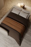 The transformation from bed to sofa takes place via a side-opening mechanism