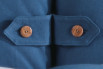 Detail of the headbiard cushions two central wooden buttons