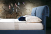 Side view of Marianne bed with cushions