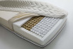 Detail of the mattress inner structure - pocket micro-springs with a sheet of memory foam and polyurethane, terrycloth and 3D fabric cover