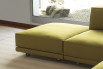 Dennis hassock with casters, here next to the same-name sofa.